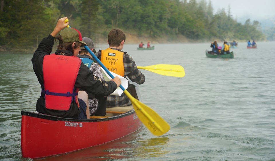 Scouts canoeing on a lake