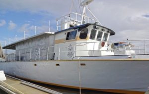 SSS Makai tied up at a dock